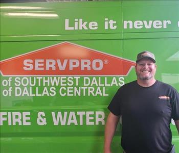 Production Manager Derek by one of our SERVPRO Vans