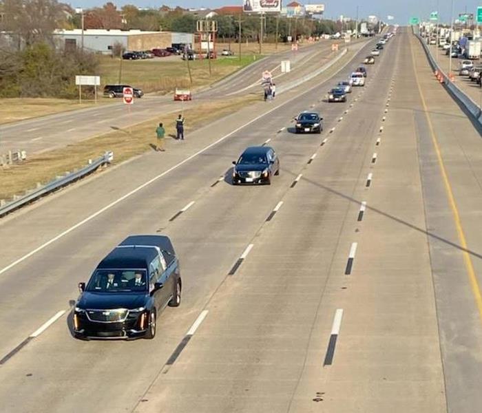 Police Motorcade on a Dallas highway for a fallen officer